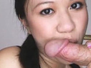 Carmina is an oriental bitch without gag reflex. This Playgirl takes a 10-Pounder all the way down her face hole and holds it for a whilst. Then Carmina gets her shaved vagina drilled then the ding-dong goes right back into her mouth. This Playgirl jerks off Thomas' penis until it